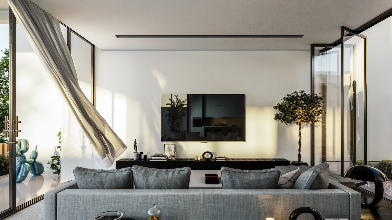 Stylish living room with floor-to-ceiling glass doors, allowing natural light and views of the garden for a relaxing atmosphere.